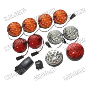 Komplet lamp ledowych Defender od 95 / Defender od 2007 (pozycja przód / pozycja/stop tył / kierunkowskazy / okrągłe lampy przeciwmgielna i cofania [95mm] / oświetlenie tablicy rejestracyjnej)