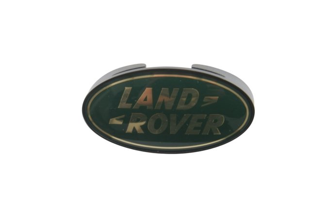 Logo "Land Rover" maskownicy chłodnicy Defender od 98 do 2010 (VIN:AA999999)
