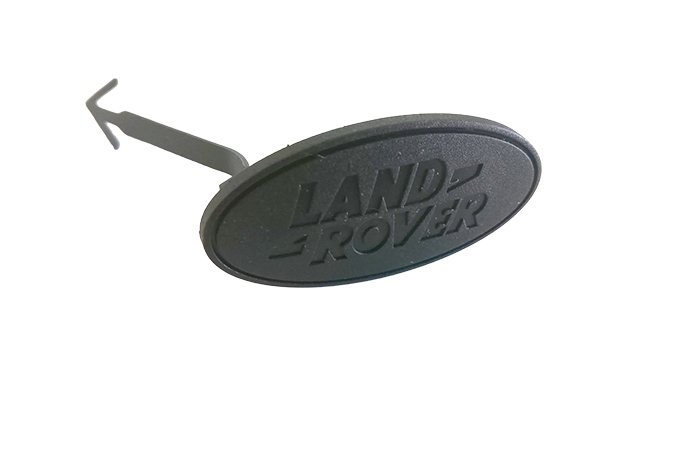 Logo "Land Rover" tapicerki drzwi przód Discovery 3 / RR Sport do 2009 (VIN:9A999999) (Ebony Black)