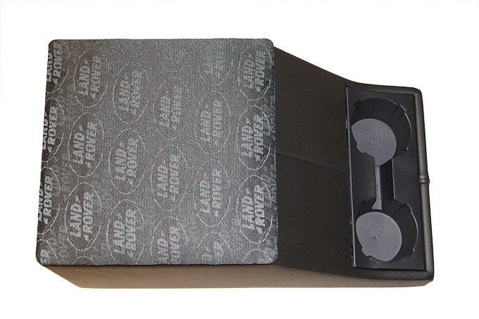 Cubby Box Defender (schowek między siedzeniami) czarny z logo Land Rover