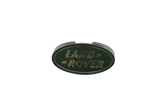 Logo "Land Rover" maskownicy chłodnicy Defender do 98