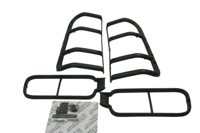 Ochraniacze lamp tył (w błotniku + zderzaku) Discovery II do 2002 (VIN: 2A999999) para