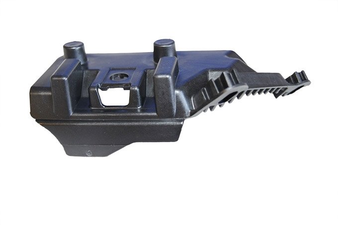 Wspornik mocowania reflektora przód lewy