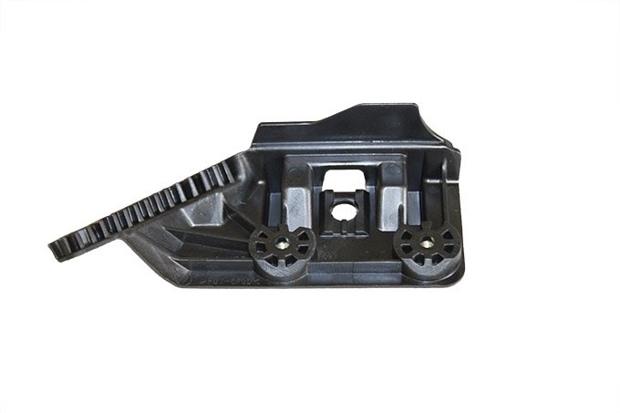 Wspornik mocowania reflektora przód prawy